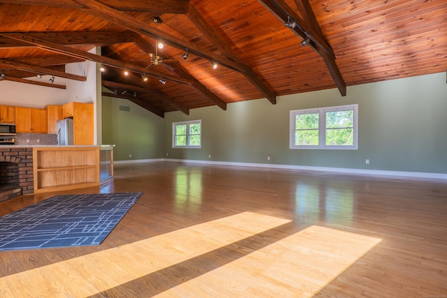 125 Woodchuck Ln, Harwinton, CT 06791 - unfurnished living room with track lighting, wooden ceiling with exposed beams, baseboards, wood finished floors, and high vaulted ceiling