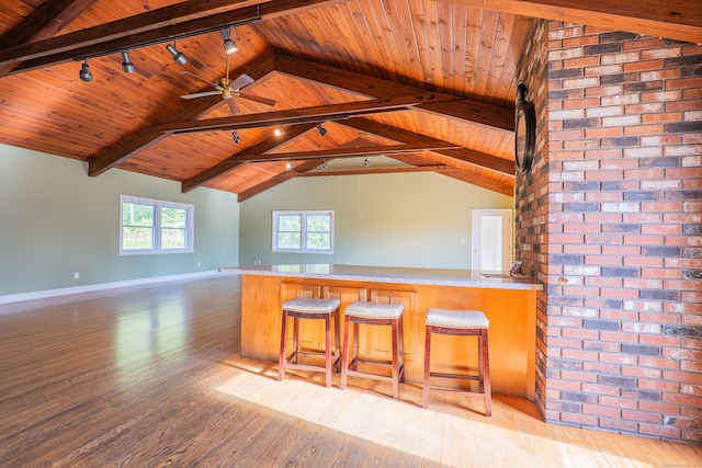 125 Woodchuck Ln, Harwinton, CT 06791 - kitchen featuring wood finished floors, open floor plan, wood ceiling, baseboards, and a peninsula