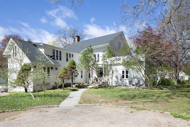 308 Main St, Salisbury, CT 06039 - neoclassical / greek revival house featuring a shingled roof, a chimney, and a front yard