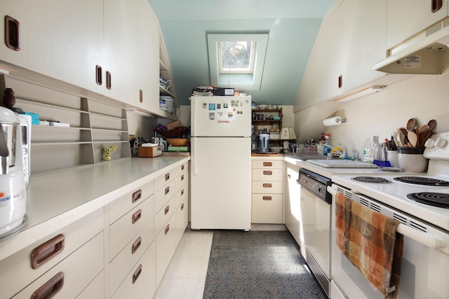 308 Main St, Salisbury, CT 06039 - kitchen featuring white appliances, under cabinet range hood, light countertops, a skylight, and a sink