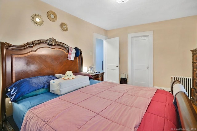 809 Burnside Ave, East Hartford, CT 06108 - bedroom featuring radiator heating unit and baseboards