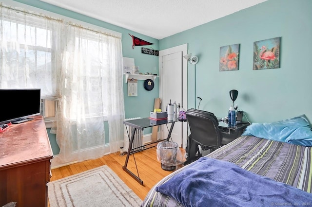 809 Burnside Ave, East Hartford, CT 06108 - bedroom featuring wood finished floors and a desk