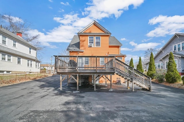 809 Burnside Ave, East Hartford, CT 06108 - back of house with a wooden deck, stairway, a carport, and a shingled roof