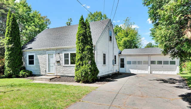 43 Ronald Rd, New Britain, CT 06053 - view of front of property featuring a garage, a front yard, stone siding, roof with shingles, and driveway