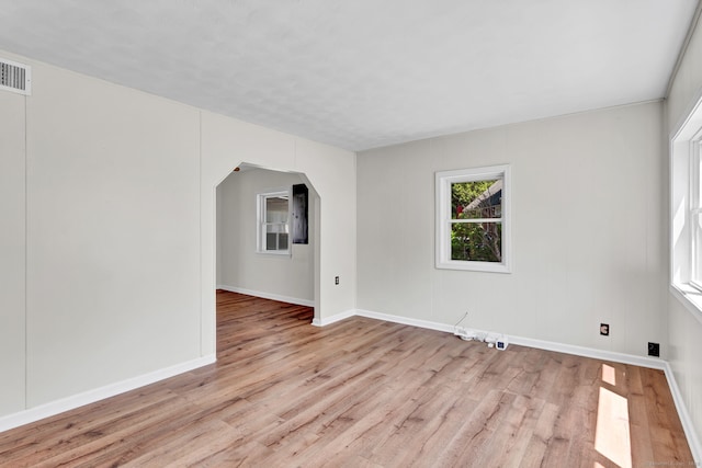 43 Ronald Rd, New Britain, CT 06053 - spare room with arched walkways, light wood finished floors, and baseboards