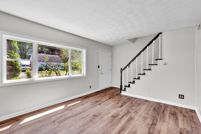 43 Ronald Rd, New Britain, CT 06053 - foyer entrance with wood finished floors, baseboards, and stairs