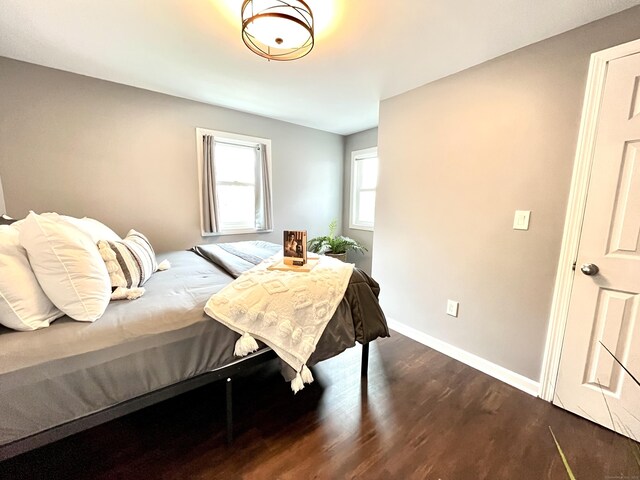 25 Mohawk Trl, East Hampton, CT 06424 - bedroom featuring dark wood-style floors and baseboards