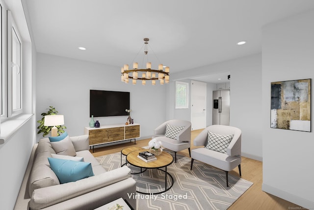 33 Hurlbut Rd, Tolland, CT 06084 - living room with light wood-style floors, a chandelier, and recessed lighting