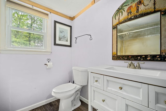 33 Hurlbut Rd, Tolland, CT 06084 - full bathroom featuring toilet, wood finished floors, baseboards, vanity, and a shower