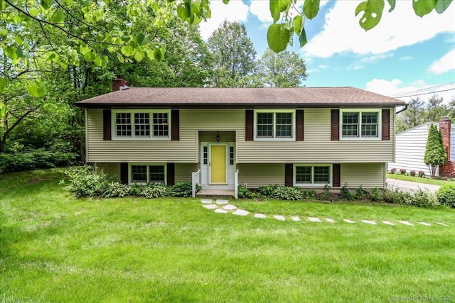 31 Buckingham Rd, New Milford, CT 06776 - split foyer home with a chimney and a front lawn