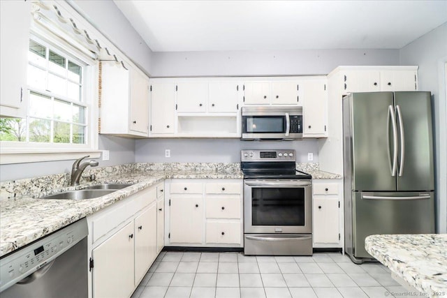 31 Buckingham Rd, New Milford, CT 06776 - kitchen featuring stainless steel appliances, a sink, white cabinetry, and light stone countertops