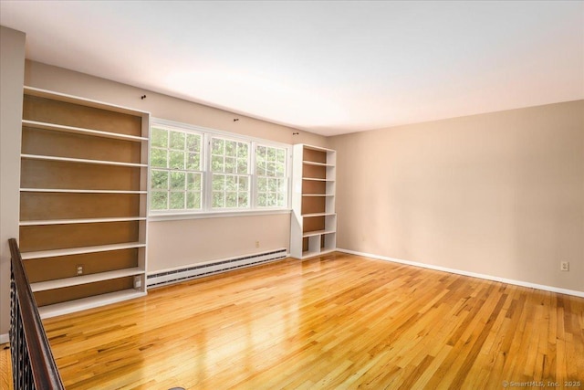31 Buckingham Rd, New Milford, CT 06776 - unfurnished room with a baseboard heating unit, wood finished floors, and baseboards