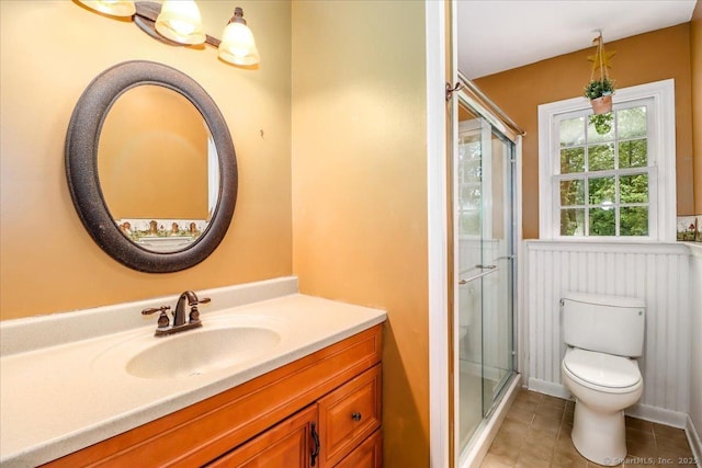 31 Buckingham Rd, New Milford, CT 06776 - bathroom with a shower stall, vanity, toilet, and tile patterned flooring