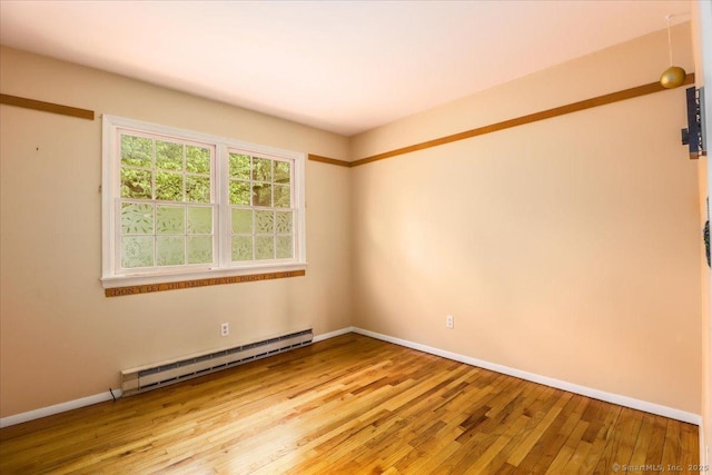 31 Buckingham Rd, New Milford, CT 06776 - spare room featuring baseboard heating, wood finished floors, and baseboards