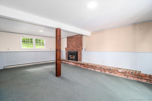 31 Buckingham Rd, New Milford, CT 06776 - unfurnished living room with baseboard heating, carpet, a wainscoted wall, a brick fireplace, and beam ceiling