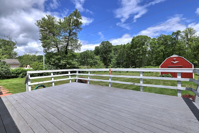 54 Mariot Cir, Wallingford, CT 06492 - wooden deck featuring an outdoor structure and a lawn