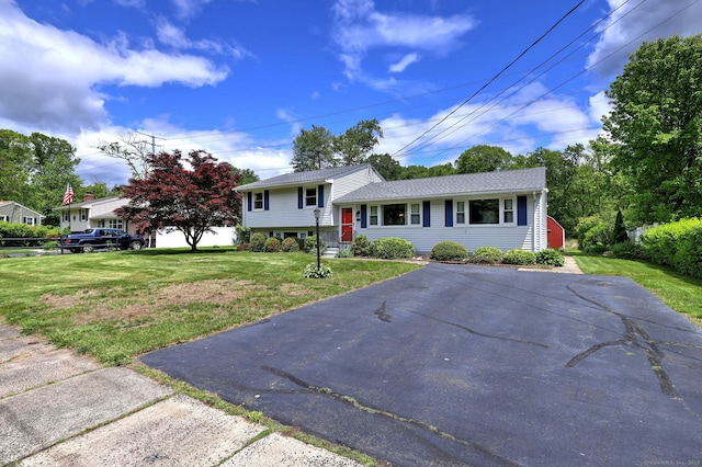 54 Mariot Cir, Wallingford, CT 06492 - view of front facade featuring a front yard and driveway