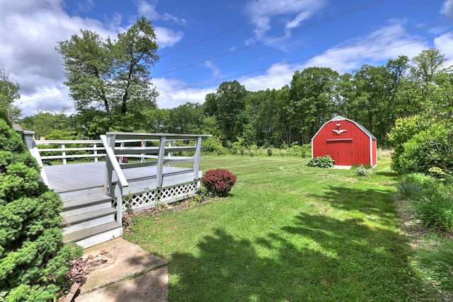 54 Mariot Cir, Wallingford, CT 06492 - view of green lawn featuring a wooden deck