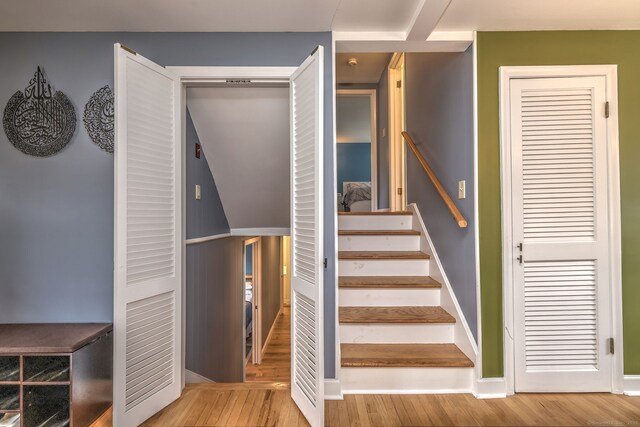 54 Mariot Cir, Wallingford, CT 06492 - staircase with wood finished floors and baseboards