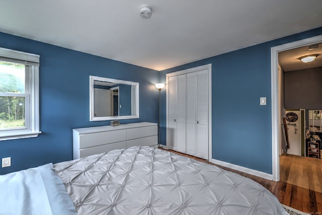 54 Mariot Cir, Wallingford, CT 06492 - bedroom featuring light wood-style floors, a closet, and baseboards