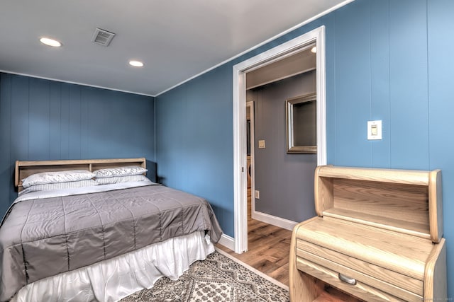 54 Mariot Cir, Wallingford, CT 06492 - bedroom featuring wood finished floors, recessed lighting, baseboards, and a decorative wall