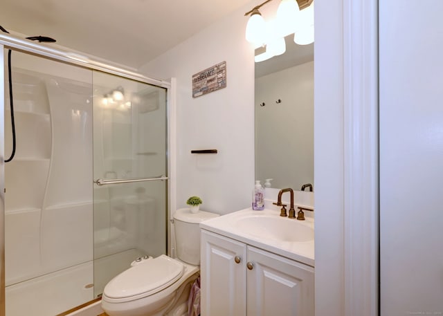 54 Mariot Cir, Wallingford, CT 06492 - bathroom featuring a stall shower, toilet, and vanity