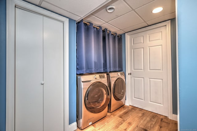54 Mariot Cir, Wallingford, CT 06492 - laundry room featuring separate washer and dryer and light wood-type flooring