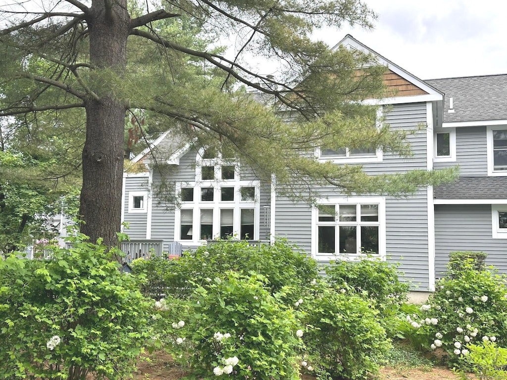 16 Riverwalk Dr Unit 16, Simsbury, CT 06089 - rear view of property with a shingled roof