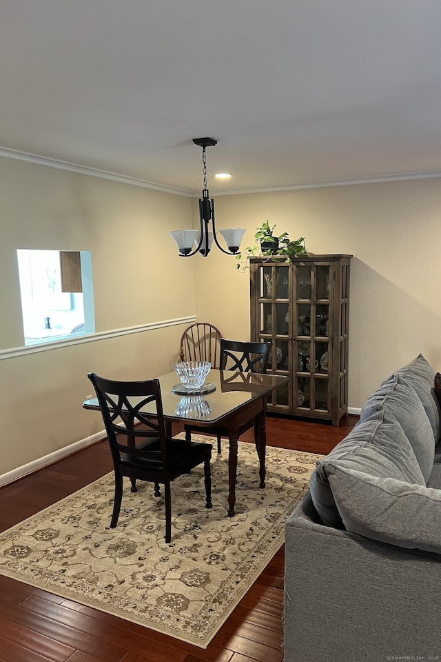 123 Old Belden Hill Rd Apt 5, Norwalk, CT 06850 - dining area featuring ornamental molding, dark wood finished floors, a chandelier, baseboards, and recessed lighting