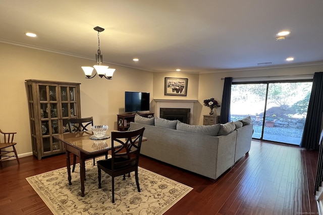 123 Old Belden Hill Rd Apt 5, Norwalk, CT 06850 - dining room featuring crown molding, a chandelier, dark wood-style flooring, a fireplace, and recessed lighting