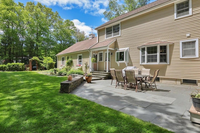 190 Bronson Dr, Middlebury, CT 06762 - rear view of property with a patio area and a lawn
