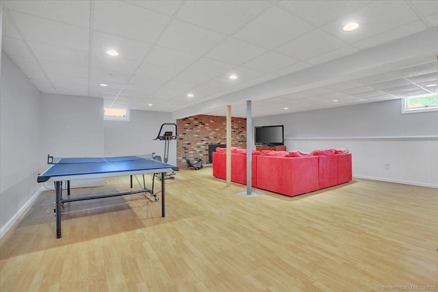 190 Bronson Dr, Middlebury, CT 06762 - recreation room featuring wood finished floors, a paneled ceiling, plenty of natural light, and baseboards