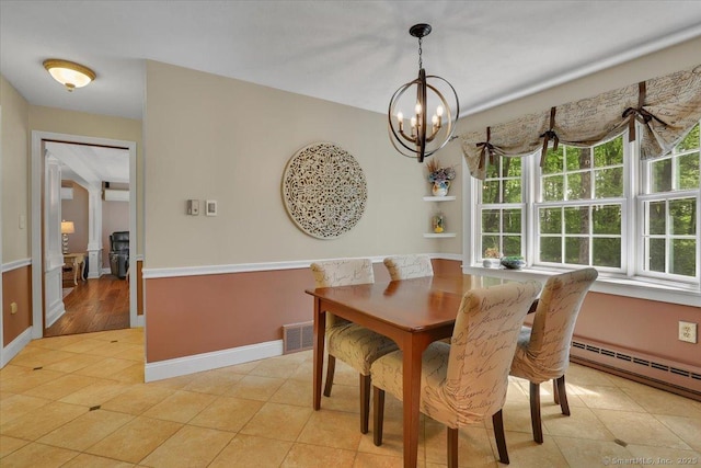 190 Bronson Dr, Middlebury, CT 06762 - dining space featuring a baseboard radiator, a chandelier, light tile patterned floors, and baseboards