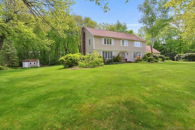 190 Bronson Dr, Middlebury, CT 06762 - view of front of house featuring a chimney and a front lawn