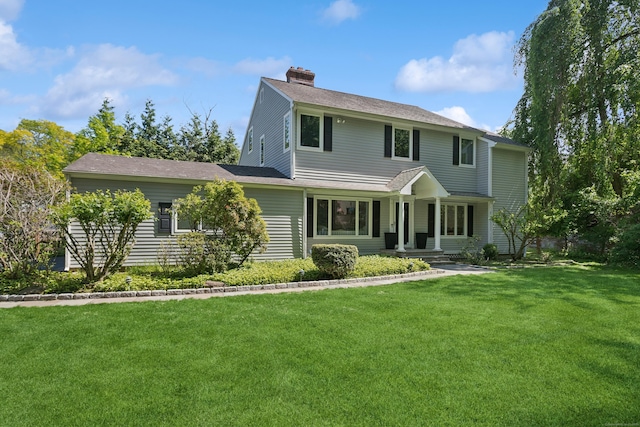 11 Valley Rd, Westport, CT 06880 - view of front of house featuring a chimney and a front lawn