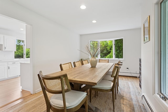11 Valley Rd, Westport, CT 06880 - dining room with a baseboard radiator, light wood-style flooring, recessed lighting, and a baseboard heating unit