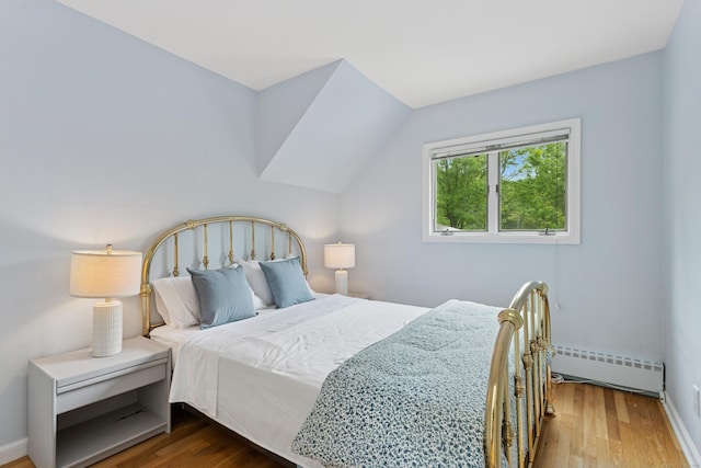 11 Valley Rd, Westport, CT 06880 - bedroom with baseboard heating and wood finished floors