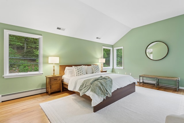 11 Valley Rd, Westport, CT 06880 - bedroom with a baseboard heating unit, vaulted ceiling, wood finished floors, and baseboards