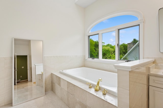 11 Valley Rd, Westport, CT 06880 - bathroom with a garden tub, vanity, tile patterned floors, and a baseboard heating unit