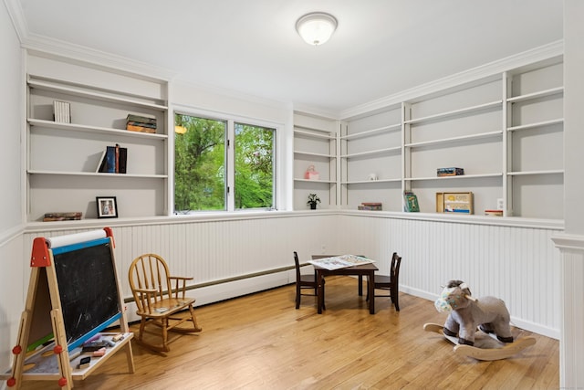 11 Valley Rd, Westport, CT 06880 - living area with ornamental molding, built in features, and wood finished floors