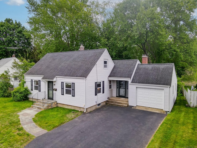 239 Old Field Ln, Milford, CT 06460 - new england style home featuring a chimney, a shingled roof, a garage, and driveway