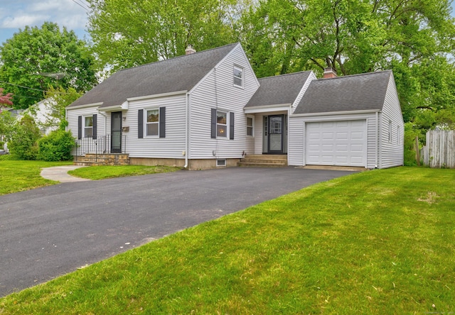 239 Old Field Ln, Milford, CT 06460 - view of front facade with a chimney, a garage, a shingled roof, and asphalt driveway