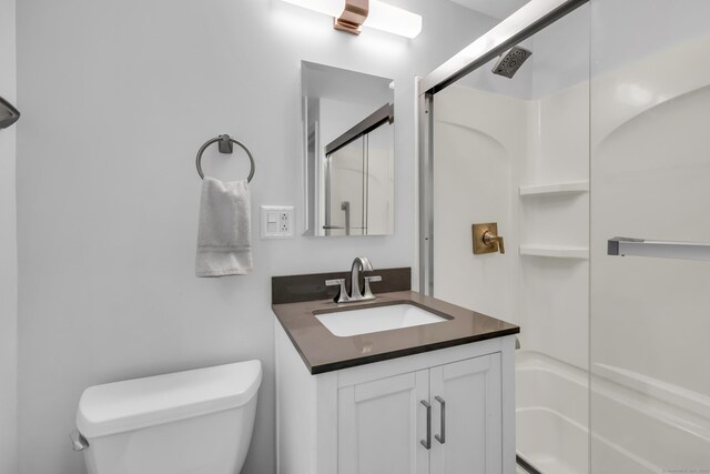 239 Old Field Ln, Milford, CT 06460 - bathroom featuring toilet, vanity, and bathing tub / shower combination