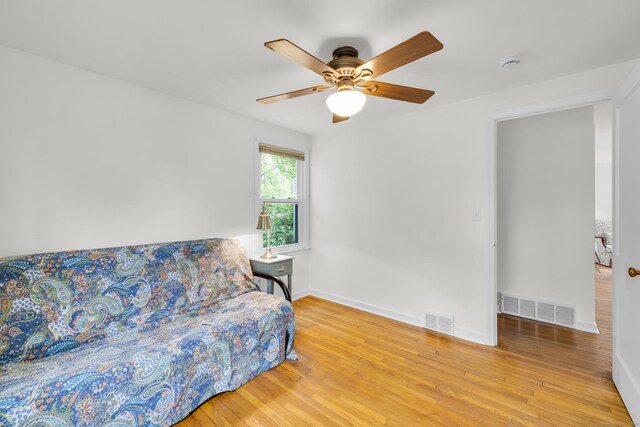 239 Old Field Ln, Milford, CT 06460 - living area with hardwood / wood-style flooring, ceiling fan, and baseboards