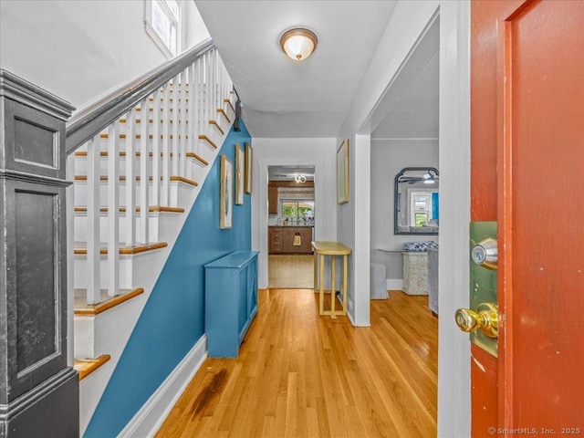 18 Geer Ave, Norwich, CT 06360 - foyer entrance with baseboards, wood finished floors, and stairway