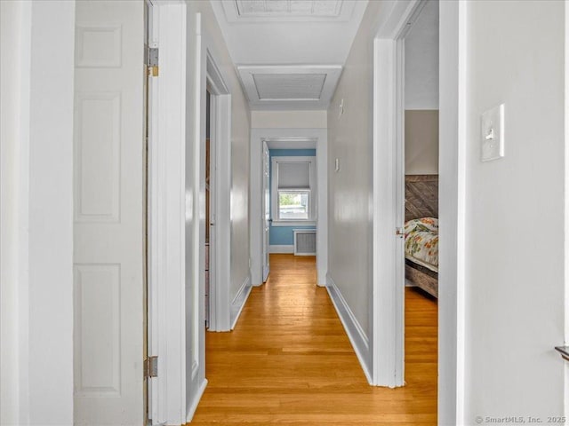 18 Geer Ave, Norwich, CT 06360 - hallway featuring attic access, light wood finished floors, and baseboards