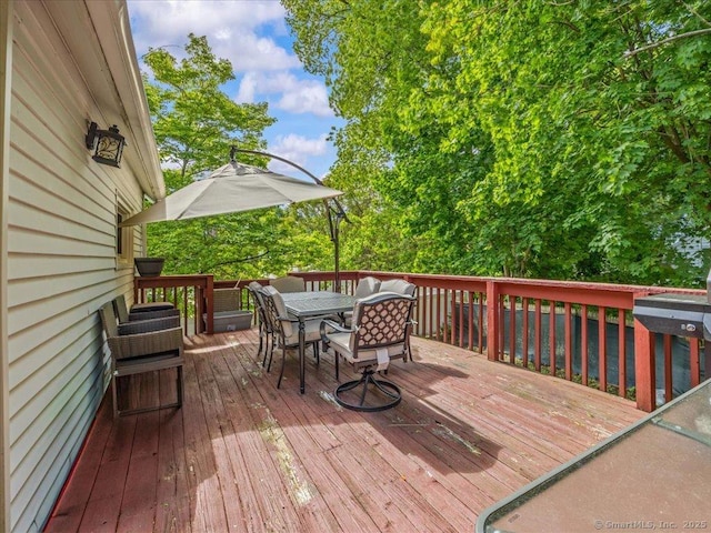 18 Geer Ave, Norwich, CT 06360 - wooden terrace with outdoor dining space