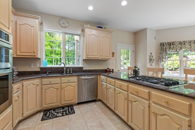 15 Ledge Rd, Southington, CT 06489 - kitchen featuring stainless steel appliances, light brown cabinets, a sink, healthy amount of natural light, and recessed lighting