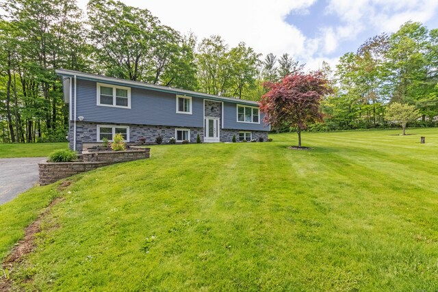 55 Linton St, Torrington, CT 06790 - raised ranch featuring a front lawn and driveway