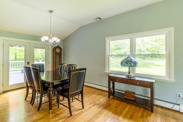 55 Linton St, Torrington, CT 06790 - dining space featuring vaulted ceiling, light wood-style flooring, a chandelier, and french doors